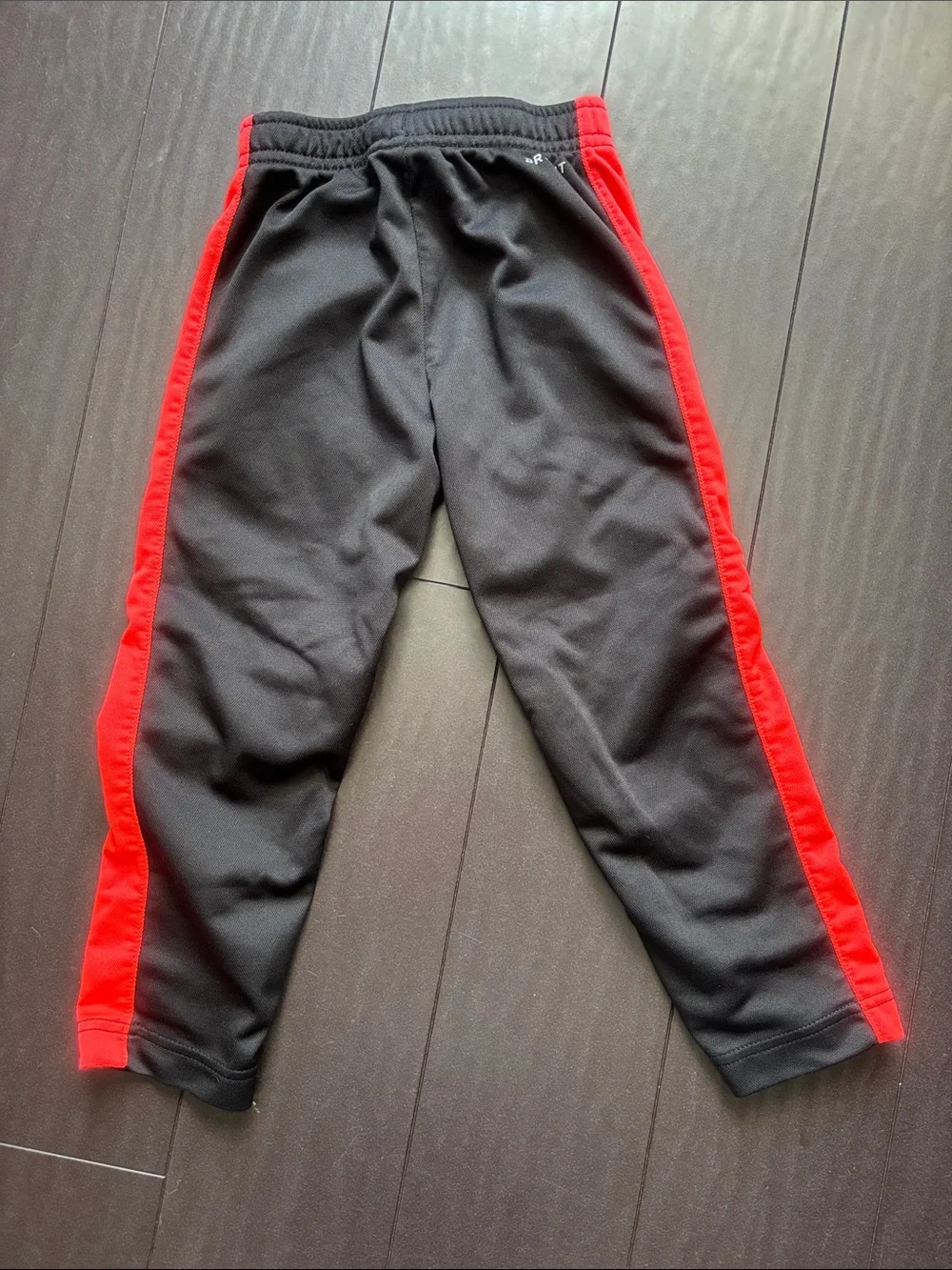 Nike Black Joggers with Red Side Stripes - Kids